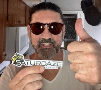 Kevin wearing SATURDAZE Optics BRUNCH WITH BESTIES holding a SATURDAZE Optics sticker and giving the thumbs up